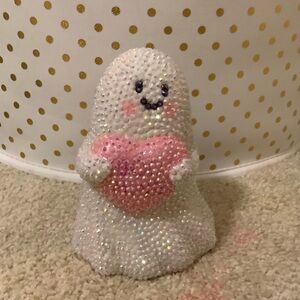 Sparkling Ghost Figurine Holding Pink Heart